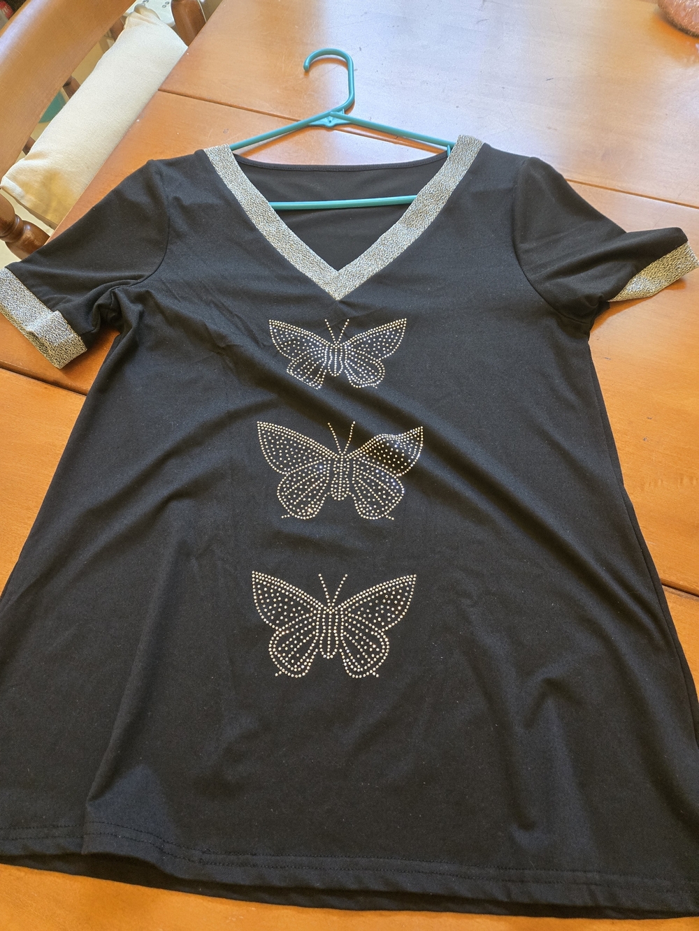 Black V-Neck Top with Rhinestone Butterfly Accents